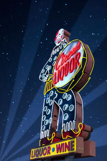 Photo of the Circus Liquor neon sign in Burbank CA, digitally lit and shown at night